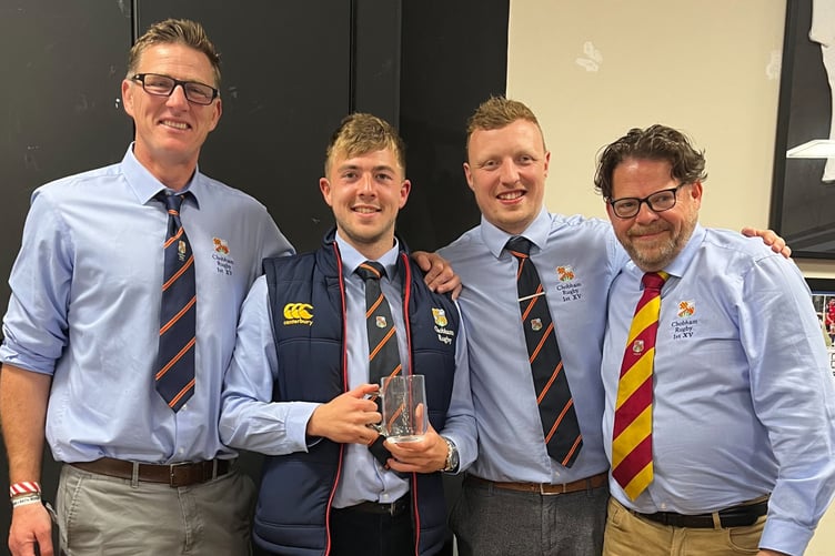 Guy Mawhood with his trophy and flanked by Chobham officials