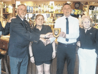 Pub honoured for years of help given to Woking Royal Naval Association