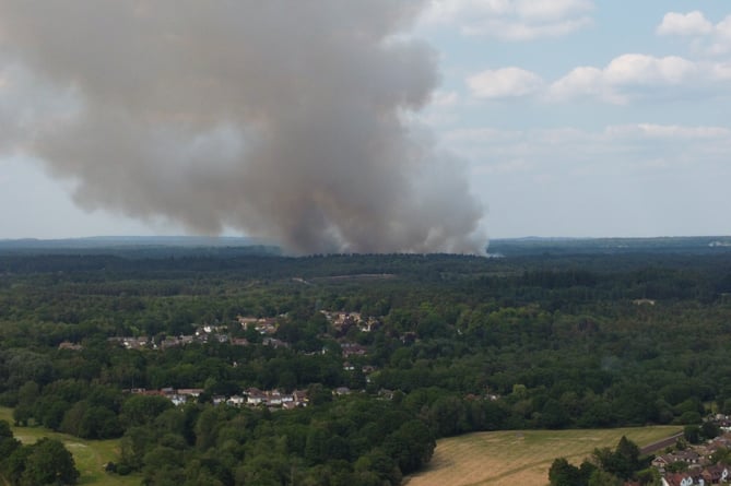 Fire crews tackling huge wildfire on the MOD-owned Longmoor Ranges near ...