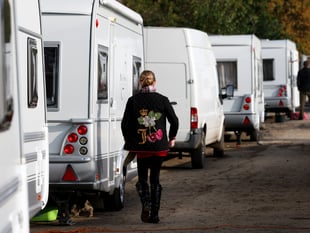 Dozens of Traveller caravans in Woking
