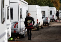 Dozens of Traveller caravans in Woking