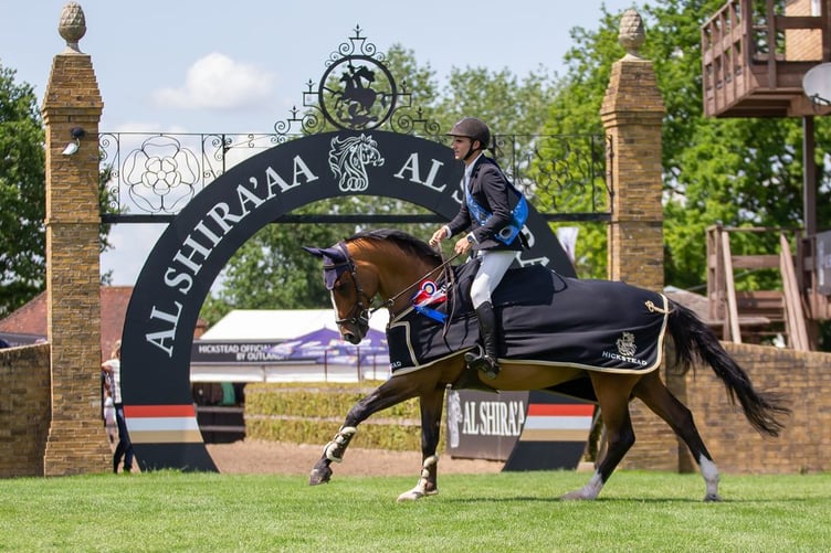James Emblen and Carl 61 en route to victory at Hickstead