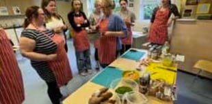 Bushy Leaze and Tantum Trust show Alton parents how to cook on budget