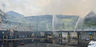 Clients of fire-hit warehouse at Byfleet fear paltry payout terms