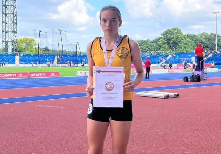 Lola Roake with the rewards of a job well done at the Alexander Stadium, Birmingham