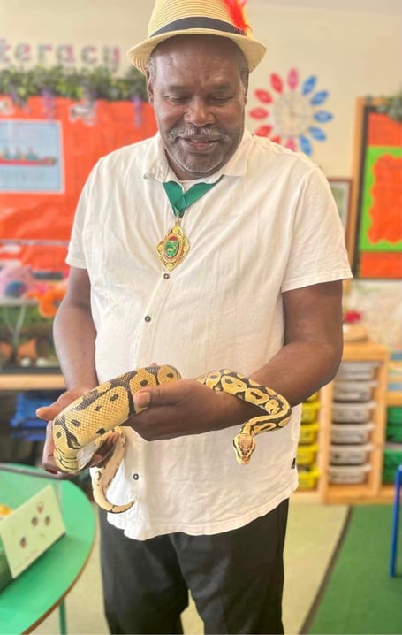 Whitehill town mayor Cllr Leeroy Scott meets a snake at the St Matthew’s CE Primary School summer fair in Blackmoor on June 24th 2023.