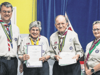 Duo's 118 years of service to Scouting in Woking really is dedication