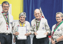 Duo's 118 years of service to Scouting in Woking really is dedication