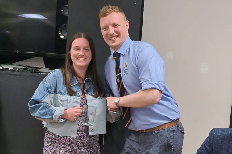 Olivia Walker receives her award after starring during 2022-23 for Surrey Chargers