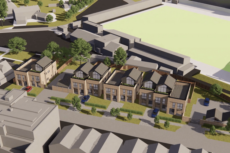 An artist’s impression of the proposed townhouses adjacent to Woking Football Club’s ground