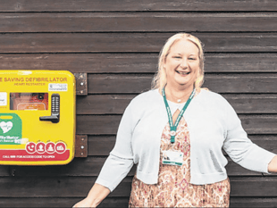 Councillors help fund new life-saving device at bowls club