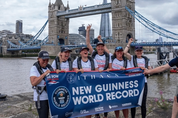 Sandra Gates, right, with her team-mates after completing the challenge