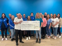 £5k presented to hospice after fundraiser at Sheerwater FC