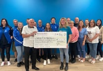 £5k presented to hospice after fundraiser at Sheerwater FC