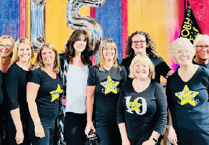 Special visitor as Rock Choir team up with neighbours for performance