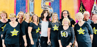Special visitor as Rock Choir team up with neighbours for performance