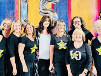 Special visitor as Rock Choir team up with neighbours for performance