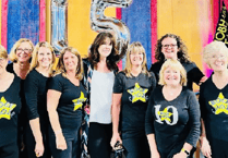 Special visitor as Rock Choir team up with neighbours for performance