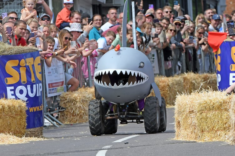 BORDON SOAPBOX
BORDON, HAMPSHIRE
ENGLAND
23rd JULY 2023
On Sunday 23rd July 2023 Whitehill & Bordon in Hampshire was transformed into the ultimate community driven soapbox spectacle, the official Bordon Soapbox Derby
With the main road through the town closed to traffic the hundreds of spectators were able to walk around the attractions that had been put in place in the early hours of Sunday before gathering many deep on Chalet Hill to watch the 'soapbox racers' take on the challenge to be the fastest competitor to get to the Finish Line !
Some of the racers were quick, some were slow, and some driver's after having spectacular spills were permitted to run to the Finish Line as long as they were carrying 'any part of their soapbox' !
(Photo by Malcolm Wells)
Standard reproduction rates apply, contact Malcolm Wells to arrange payment - Mobile: 07802-217-569
malcolmrichardwells@gmail.com
