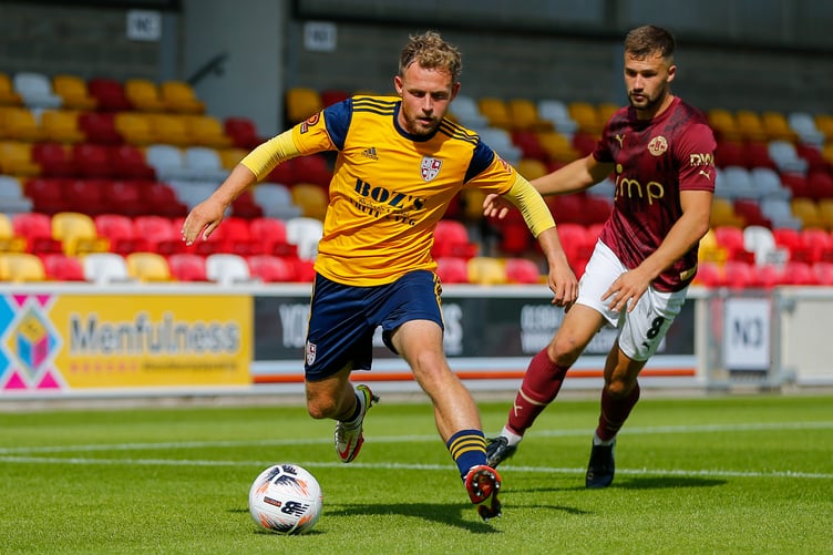 Woking captain Josh Casey on the ball in their first game of the 2022-23 Vanarama National League season, away to York City. Casey is hoping the Cards bring home maximum points from Kidderminster Harriers in their 2023-24 opener on Saturday