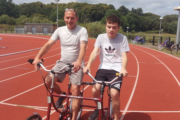 Lee Roake and his dad Anthony get in some bike training