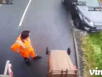 Oops! Range Rover 4x4 drives into a ditch undertaking a bin lorry