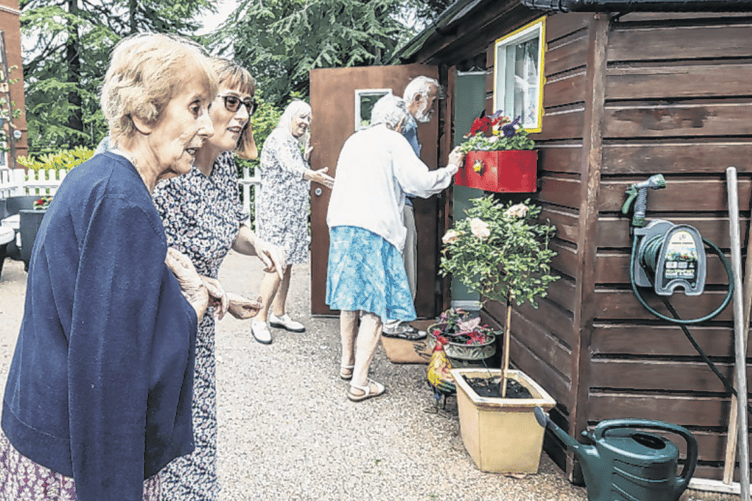 Residents of Horsell Lodge Care Home at the opening of Grandma’s Cottage