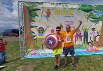 Blind Lee smashes charity target in his first triathlon