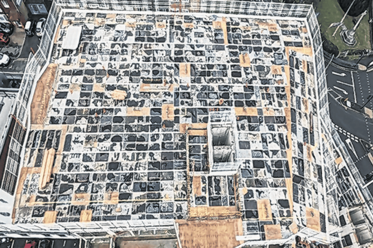 Roof decking at Copper Pot House is ready for concrete to be poured as the building rises above West Byfleet