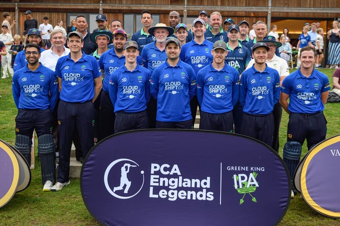 Valley End, bright blue shirts, and the PCA England Legends line up at Woodlands Lane before their Twenty20 match that was watched by a crowd of 700 			                