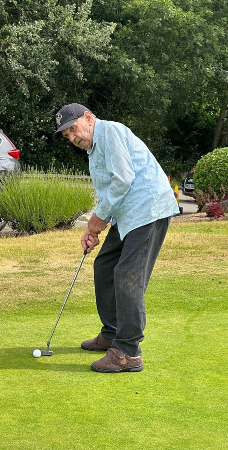 Dennis Clark playing golf at the Pyrford Lakes club