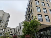 Emergency measures in place at Woking tower block over cladding fears