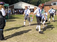 Morris dancers beat the heat with bells and baldricks in West End
