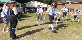 Morris dancers beat the heat with bells and baldricks in West End