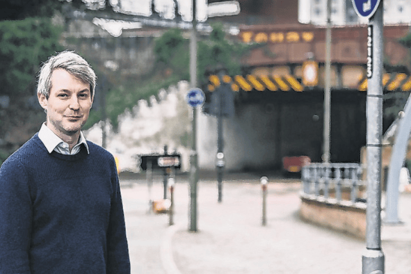 Cllr Will Forster with the Victoria Arch in the background