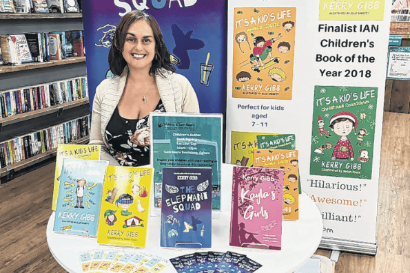 Kerry Gibb with an impressive array of her work at a recent book signing