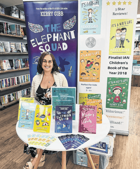  Kerry Gibb with an impressive array of her work at a recent book signing