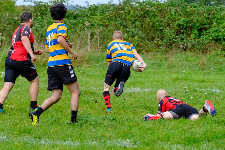 Keilhan Watson goes over for one of his three tries against Croydon