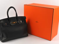 Big names galore in vintage fashion auction