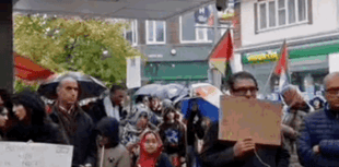 Eighty attend Middle East vigil held in Woking town centre