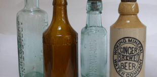 Ancient bottles uncovered during restoration of canal in Woking