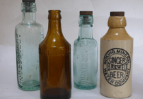 Ancient bottles uncovered during restoration of canal in Woking
