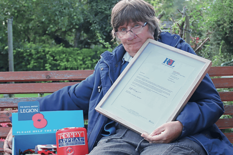 Sharon Smith with her Poppy Appeal certificate