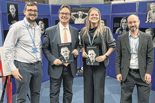Event guests, from left, York Road Project trustee Nathan Bennett, Woking MP Jonathan Lord, YRP chief executive Cherisse Dealtry and YRP trustee Andrew Humphreys