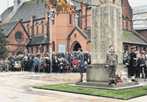 Woking town centre falls silent for Remembrance service