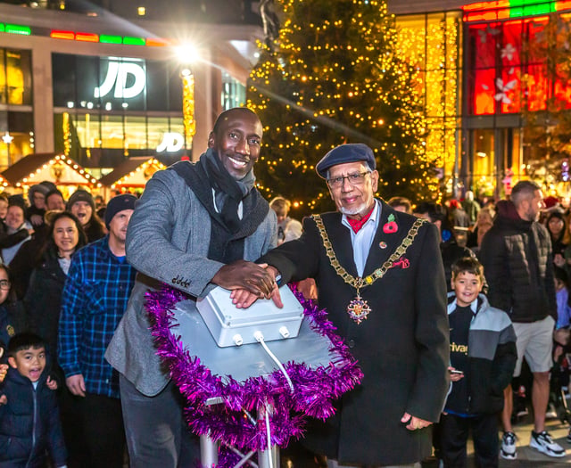 Hasselbaink makes star turn at Woking Christmas tree lights switch on