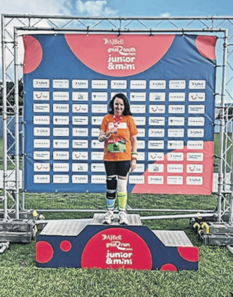 Anne with her medal after completing the Great South Run