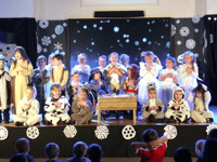 Chobham reception pupils take first steps on stage by singing carols
