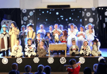 Chobham reception pupils take first steps on stage by singing carols