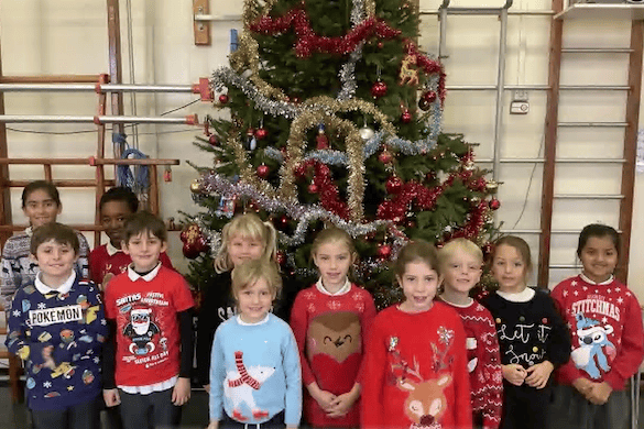 Holy Trinity pupils in their Christmas jumpers